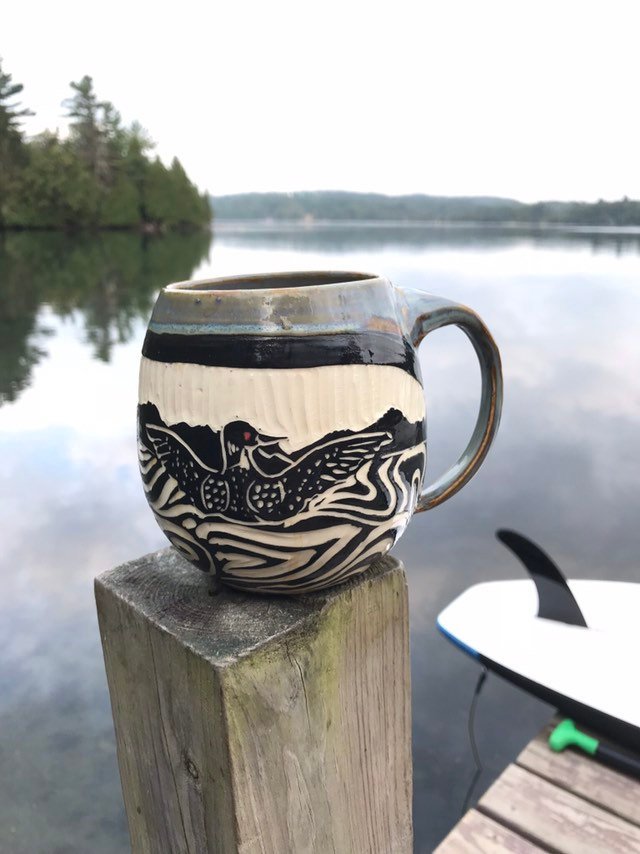 Loon mug sgraffito pottery in brown gray glaze