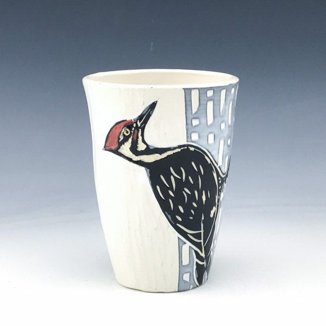 Handmade ceramic pileated woodpecker pint tumbler in sgraffito black white and red